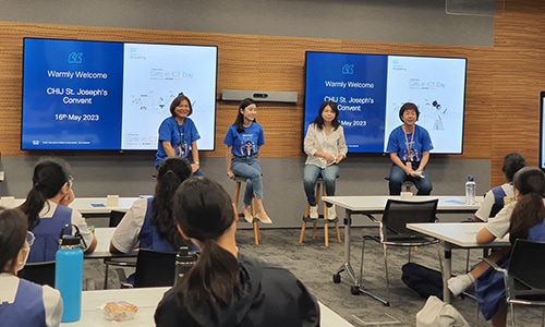 Image of four women giving a presentation