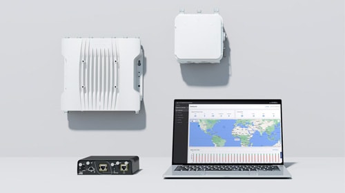 Cisco IW9165E, IW9167E, IW9165D, and a laptop displaying a management tool interface